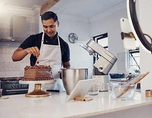 Image showing Man, vlog and baking chocolate cake in kitchen, live streaming and recording a dessert tutorial on social media. Happy chef, digital content creator or food influencer filming a virtual cooking class