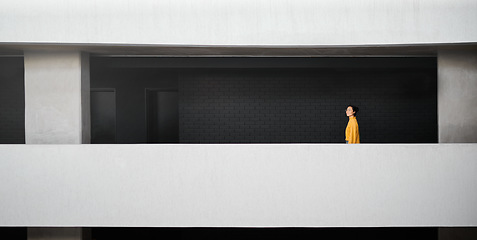 Image showing Thinking, inspiration and woman in a work building for a goal, motivation and idea for an agency. Calm, success and Asian employee with a vision for an architecture company walking in a corridor