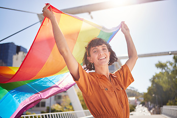 Image showing Portrait, pride and woman with smile and flag for lgbtq community, ally or lesbian with support and equality in love. Rainbow, parade outdoor and lgbt awareness, inclusion celebration and sexuality
