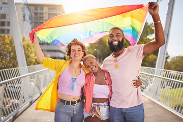 Image showing Portrait, rainbow and flag with a lgbt friends outdoor together for diversity, gay pride or freedom. Support, equality and human rights with a man and woman friend group standing outside for politics