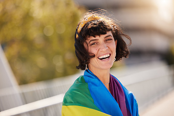 Image showing Love, equality and portrait of woman with pride flag in city, happy non binary lifestyle of freedom and peace. Happiness, summer and fun for gender neutral people in lgbt rainbow community with smile