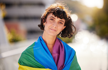 Image showing Love, freedom and portrait of woman with pride flag in city, happy non binary lifestyle of equality and peace. Happiness, summer and fun for gender neutral people in lgbt rainbow community with smile