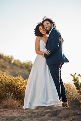 Image showing Wedding bride and groom portrait at sunset with embrace together for love, care and connection in nature. Partner, soulmate and bond of interracial people at outdoor marriage celebration on hill.