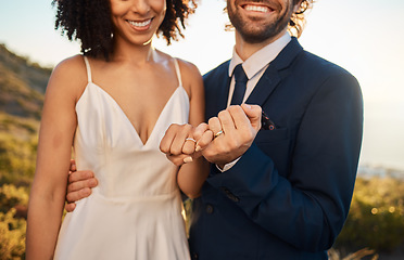 Image showing Pink promise, marriage and wedding couple hands together outdoor for trust, love and care. Support, solidarity and agreement in nature at intimate celebration with bride and man feeling happy