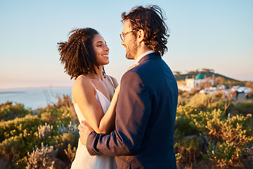 Image showing Love, happy and wedding with couple in nature for celebration, happiness and romance. Sunset, hug and affectionate with man and woman in embrace at countryside for ceremony, marriage and smile