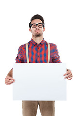 Image showing Banner, man and portrait in studio with blank, advertising and space or billboard on white background. Face, paper and mock up by handsome guy with poster, marketing and confident, cool and isolated