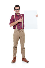 Image showing Businessman, portrait and pointing to blank, paper or billboard in studio, space and white background. Face, employee and man with advertising, poster and marketing mockup while standing isolated