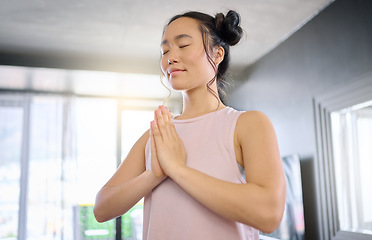 Image showing Yoga, meditation and praying woman training her mind for peace, zen and calm start to the morning. Hope, freedom and Asian girl in the living room for a mindset exercise, spiritual and mindfulness