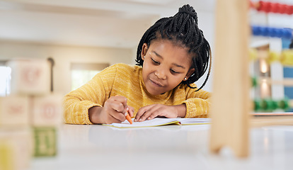 Image showing Education, girl and child writing at table for homework, lesson and home school activity in her house. Learning, student and child development, student and distance learning, focus and drawing