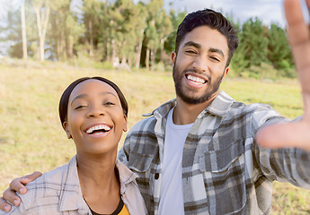 Image showing Portrait, interracial and couple in nature, love and happiness on vacation, romance and bonding. Romantic, black woman and happy man in countryside, holiday and adventure for quality time and loving