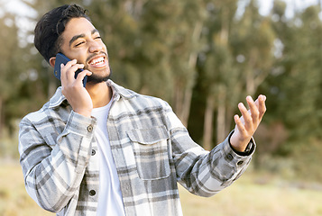 Image showing Happy, laugh and phone call by man in a park, laughing while showing hand for wtf gesture on nature background. Smartphone, conversation and handsome male with hands, sign and surprised in forest