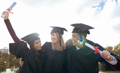 Image showing Graduation, friends and celebration with certificate, diploma and education success at outdoor college event. Happy people, graduate group and smile of university goals, award and motivation to study