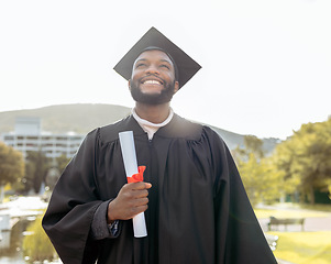 Image showing Graduation, black man and thinking of success, achievement and goals at outdoor college event. Graduate, education award and smile for happy future, dream and motivation of learning, hope and pride