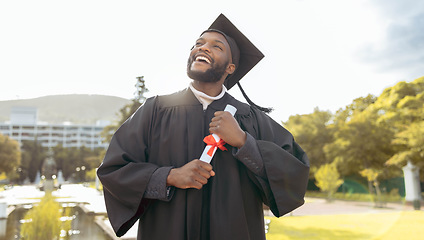 Image showing Student graduation, black man and thinking of success, achievement or goals at outdoor college event. Happy graduate, education award and future mission, dream and motivation of degree, hope or pride