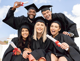 Image showing Graduation, diversity students and portrait for education success on sky background. Excited graduates, happy friends and celebration of study goals, university award and smile at college event