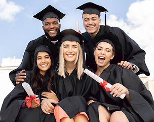 Image showing Graduation, student group and happy portrait for success, diversity and sky background. International graduates, friends and celebration of study goals, award and smile for college education event