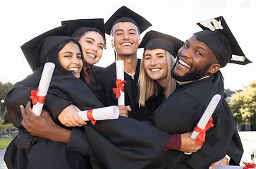 Image showing Graduation, group portrait and hug for celebration, success and education event outdoor. Diversity, students and excited graduates celebrate at happy campus, university goals and college dream award