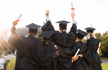 Image showing Graduation, group and back view of students celebrate education success. Behind of excited graduates at campus celebration for study goals, university award and learning motivation for happy future