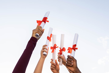 Image showing Students graduation, hands and certificate in sky for success, education and future. Closeup group, graduates and diploma outdoor of knowledge award, winner and learning scholarship with motivation