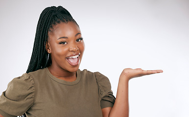 Image showing Mockup, palm and portrait of happy woman, studio background and advertising space. Happy female model, hands and product placement of marketing promotion, excited announcement and commercial offer