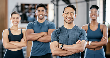 Image showing Fitness, portrait and man personal trainer with clients standing with crossed arms in the gym. Sports, collaboration and happy people after exercise, workout or training class in sport studio.