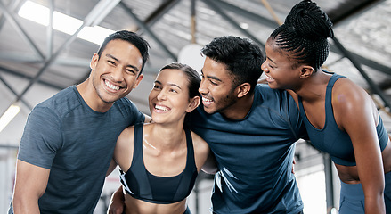 Image showing Diversity, fitness and team collaboration for exercise, workout or training together at a indoor gym. Happy diverse group of people with smile in sports teamwork, huddle or hug for healthy exercising