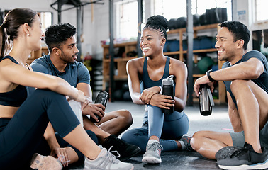 Image showing Fitness, conversation and friends at the gym for training, exercise motivation and relax after cardio. Laughing, happy and people with a group discussion about a workout, health class and performance