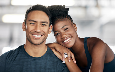 Image showing Fitness, portrait or couple of friends at gym bonding and embrace or hug in training, exercise or workout. Team partnership, coach or happy black woman in smile with pride together in a health club