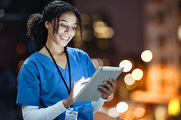 Image showing Medical, research and night with doctor and tablet for planning, medicine and schedule. Technology, review and digital with black woman reading report for healthcare, science and life insurance news