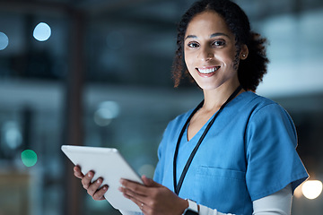 Image showing Tablet, nurse portrait and black woman in hospital working on telehealth, research or online consultation. Medical, healthcare and female physician with technology for wellness app in clinic at night