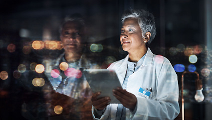 Image showing Healthcare, tablet and thinking with a doctor woman at night, working overtime in the evening after dark. Medical, research or idea and a mature female medicine professional at work with a cityscape