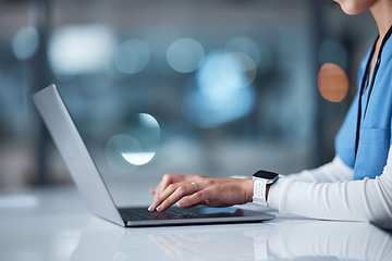 Image showing Doctor, hands and laptop in healthcare research, browsing or searching online for medical data at night in a hospital. Hand of nurse typing on computer in communication, email or networking at clinic