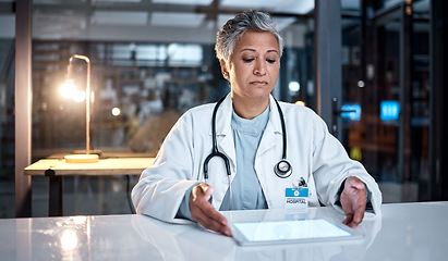 Image showing Healthcare, tablet and senior doctor in hospital for medical report, planning and research online. Digital mockup, cardiology and woman with tech device for telehealth, insurance and consultation