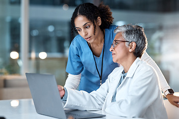 Image showing Doctors, thinking or laptop in night teamwork, medical research or surgery planning in wellness hospital. Talking, nurse or healthcare women on technology for collaboration help or life insurance app