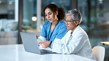 Image showing Doctor, team with healthcare and women with laptop, working together and digital hospital schedule or agenda. Technology, medical innovation and collaboration, partnership and cardiovascular surgeon