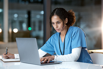 Image showing Laptop, healthcare and doctor writing in notebook for medical research, planning and schedule in hospital. Telehealth, research and black woman with digital tech for online consultation in clinic