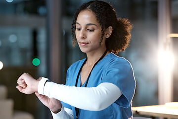 Image showing Doctor, woman and wristwatch at night in clinic office for personal health, wellness or time. Medical expert reading, iot tech or smartwatch to monitor healthcare for blood pressure in dark hospital