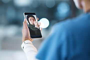 Image showing Doctor hands, video call and telehealth with phone, patient and advice at night in hospital office. Medical expert, smartphone and communication for healthcare, consulting or help woman on web app