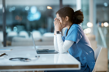 Image showing Burnout nurse, stress and black woman in hospital feeling pain, tired or sick on night shift. Healthcare, wellness and female medical physician with depression, anxiety or stressed while working late