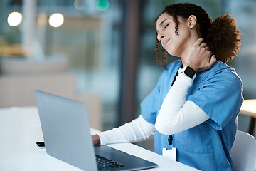 Image showing Doctor, laptop and neck pain at night in agony, stressed or burnout by desk at the hospital. Woman medical professional suffering from painful injury, ache or inflammation working late on computer