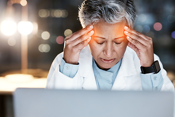 Image showing Night, stress and headache with doctor at laptop for medical, stress and deadline review. Burnout, accountability and mental health with senior woman for healthcare, medicine and science research