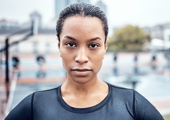 Image showing Fitness, exercise and portrait of a woman athlete in the city for an outdoor run or sports training. Serious, motivation and face of young female runner with crossed arms after cardio workout outside