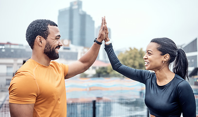 Image showing Couple of friends, high five and exercise in city for workout success, team support and marathon winner. Happy athletes, sports motivation and celebration of achievement, wellness and fitness goals