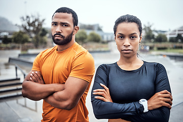 Image showing Fitness, athlete and portrait of couple after workout, run or sports training in the city. Motivation, serious and young man and woman runners standing with crossed arms after outdoor cardio exercise