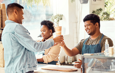 Image showing Customer, purchase and coffee shop service for man at a cafe or restaurant with friendly worker in the morning. Beverage, consumer and man gives satisfied buyer an expresso or tea in a store