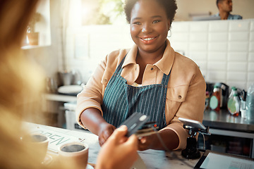 Image showing Credit card, payment and shopping with black woman in coffee shop for retail, restaurant and food service. Finance, store and purchase with hands of customer in cafe for spending, consumer and sales