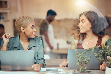 Image showing Cafe, meeting and business women talking with laptop for b2b networking, discussion and conversation. Communication, collaboration and female workers working on project ideas, planning and strategy