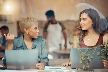 Image showing Discussion, laptop and business women in cafe window for conversation, planning and b2b networking. Communication, teamwork and female workers talking for project ideas, strategy report and research