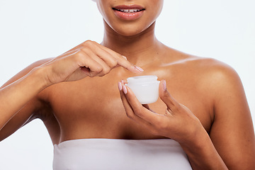 Image showing Cream, jar and woman skincare for face, body and cosmetics in studio, isolated and white background. Facial lotion, beauty product and model with container for healthy glow, shine or aesthetic makeup