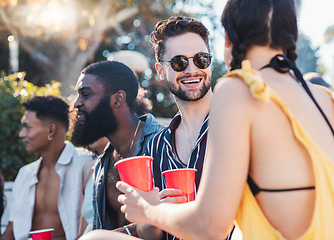 Image showing Party, drinks and friends speaking while on a summer vacation, adventure or weekend trip. Happy, smile and people in conversation, bonding or drinking at event or celebration on holiday in Australia.